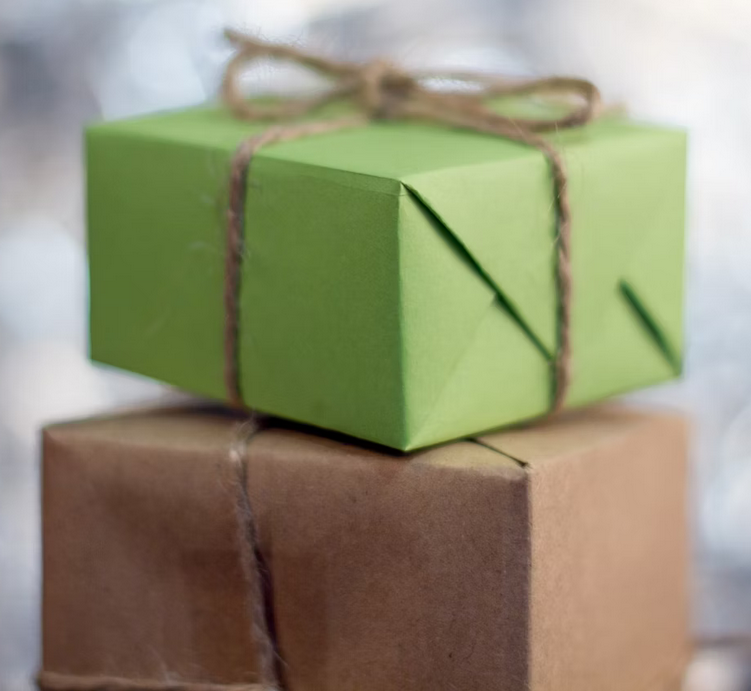 Screenshot 2025-11-01 at 11-53-03 Two wrapped presents sitting on top of each other photo – Free Background Image on Unsplash gift