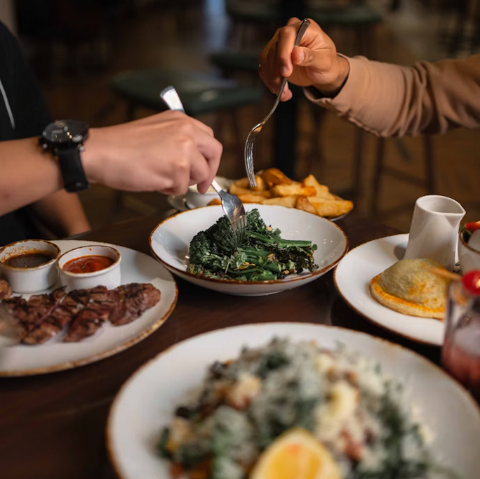 Screenshot 2025-10-29 at 07-46-30 A couple of people that are eating some food photo – Food Image on Unsplash food