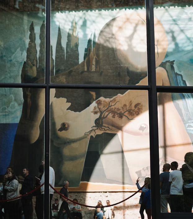 Screenshot 2025-12-22 at 08-43-18 A group of people standing outside of a building photo – Free Painting Image on Unsplash